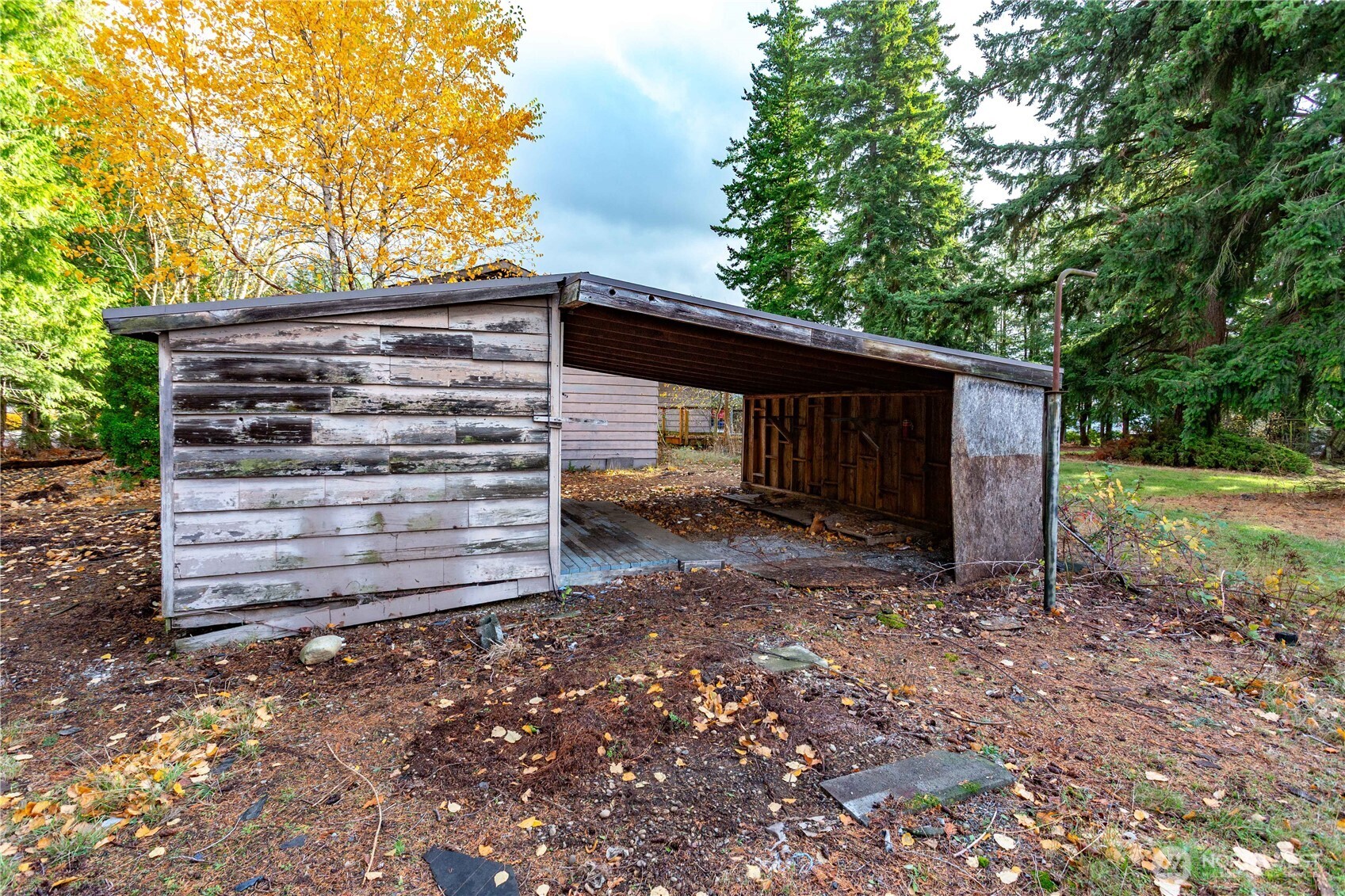 4045 Iron Gate Road Bellingham, WA 98226 - Photo 17 of 35 a view of a house with a yard