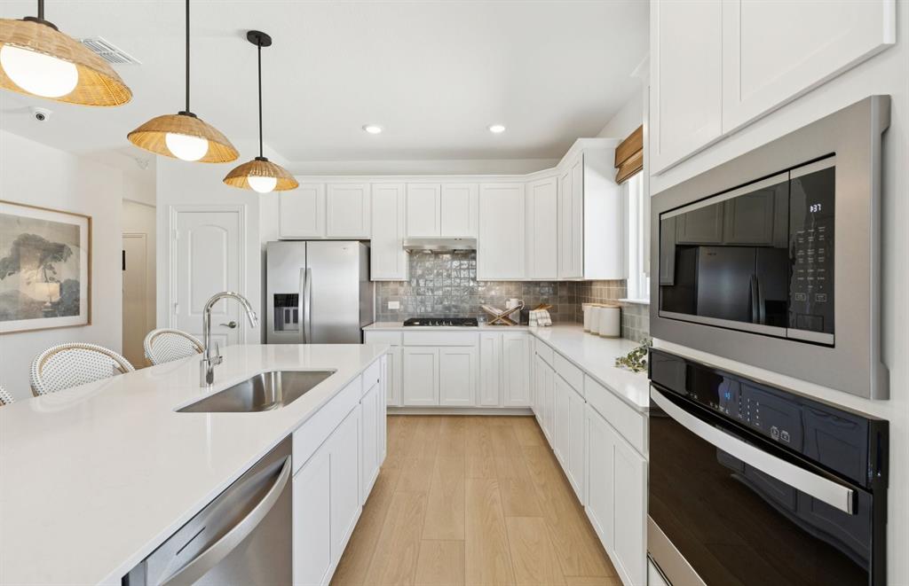 3321 Red Deer Road Denton, TX 76208 - Photo 4 of 14 *Model Representation - Abundant cabinet space in kitchen