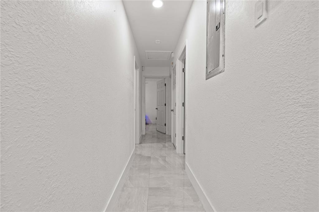 13002 East Wheeler Road Dover, FL 33527 - Photo 7 of 22 a view of hallway