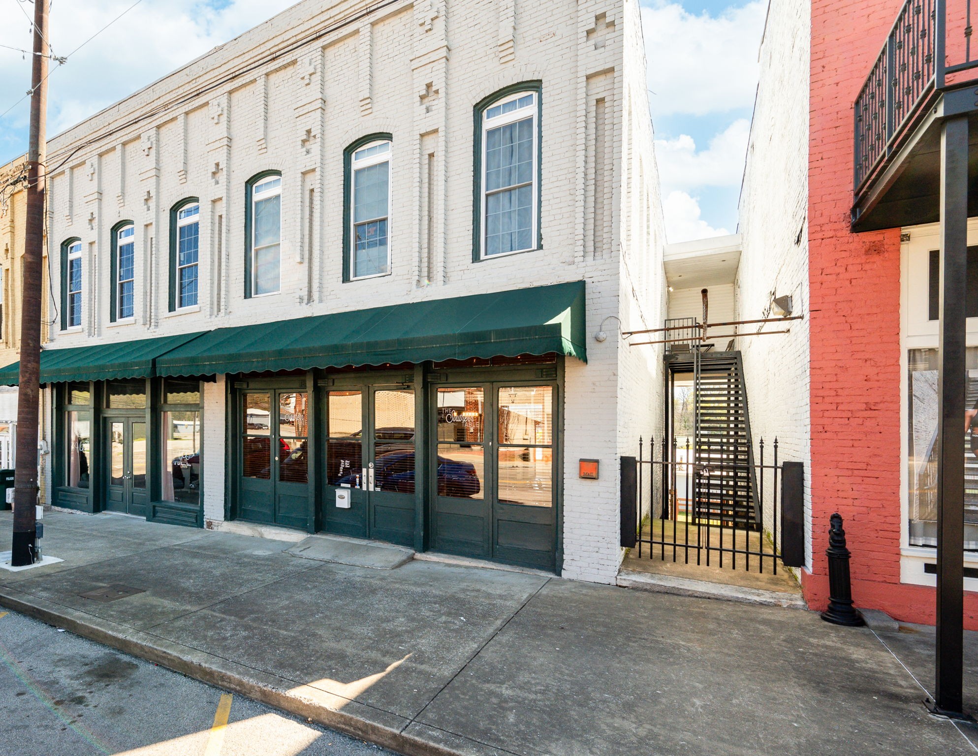 227 North 1st Street, Unit LOFT Pulaski, TN 38478 - Photo 8 of 8 a view of a building with brick walls