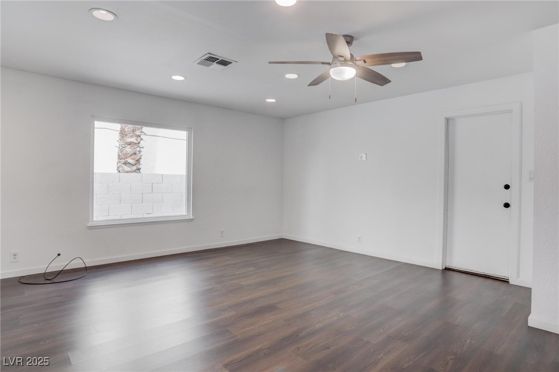 4775 Monaco Road Las Vegas, NV 89121 - Photo 25 of 31 Unfurnished room featuring dark wood-type flooring and ceiling fan