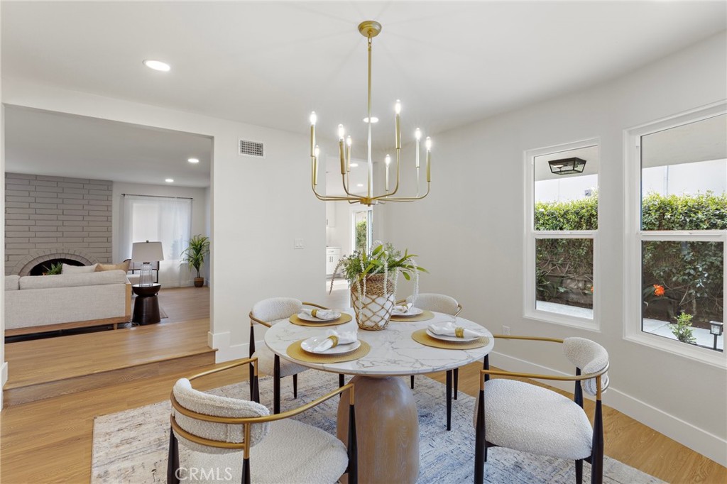 7848 Calmcrest Drive Downey, CA 90240 - Photo 14 of 36 Large dining room with natural light