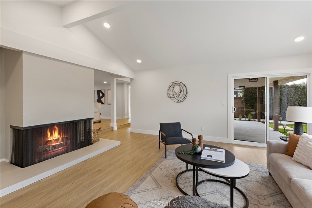 7848 Calmcrest Drive Downey, CA 90240 - Photo 15 of 36 Family room with secondary fireplace