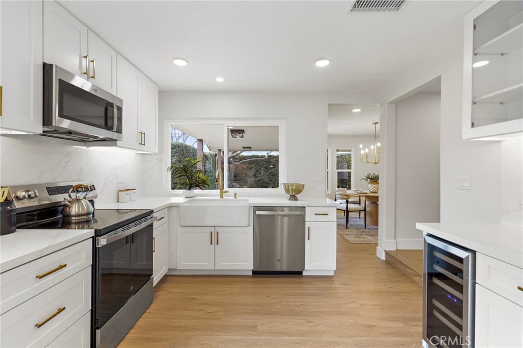 7848 Calmcrest Drive Downey, CA 90240 - Photo 8 of 36 Brand new appliances including a wine refrigerator