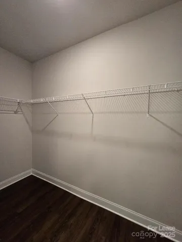 a view of a room with racks on the wall