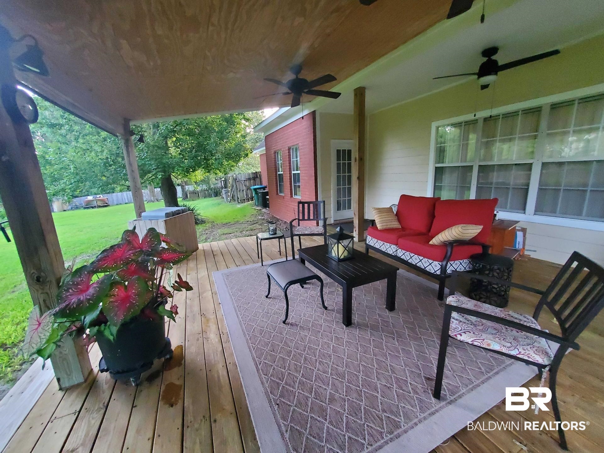 31163 Woodland Way Daphne, AL 36527 - Photo 37 of 44 Wooden deck featuring ceiling fan and outdoor lounge area