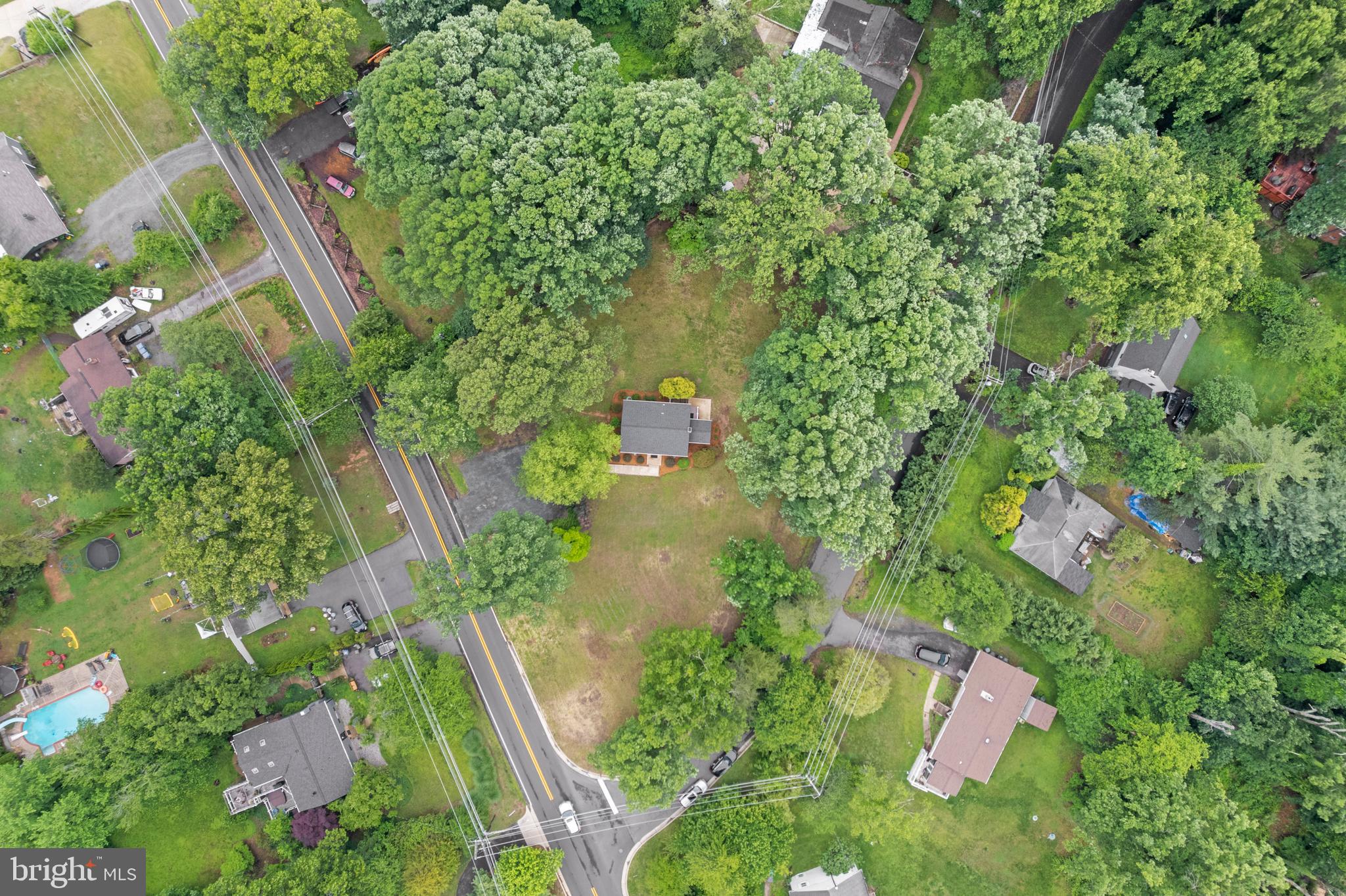 12131 Waples Mill Road Oakton, VA 22124 - Photo 38 of 40 an aerial view of residential house with outdoor space and trees all around