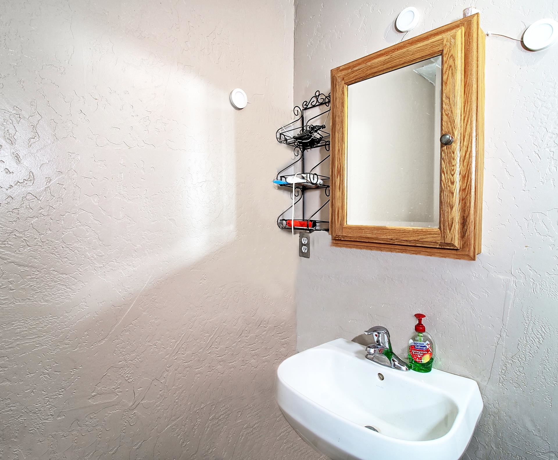 990 T Road Mack, CO 81525 - Photo 12 of 42 a bathroom with a sink and a mirror