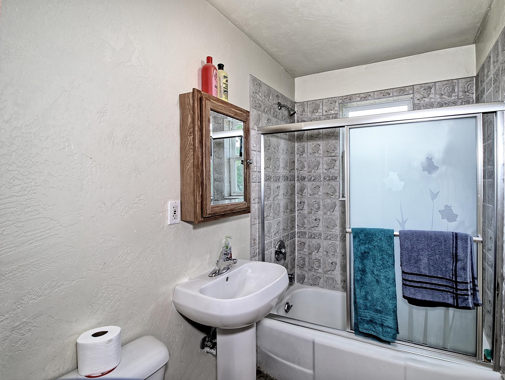 990 T Road Mack, CO 81525 - Photo 16 of 42 a bathroom with a sink a toilet and shower