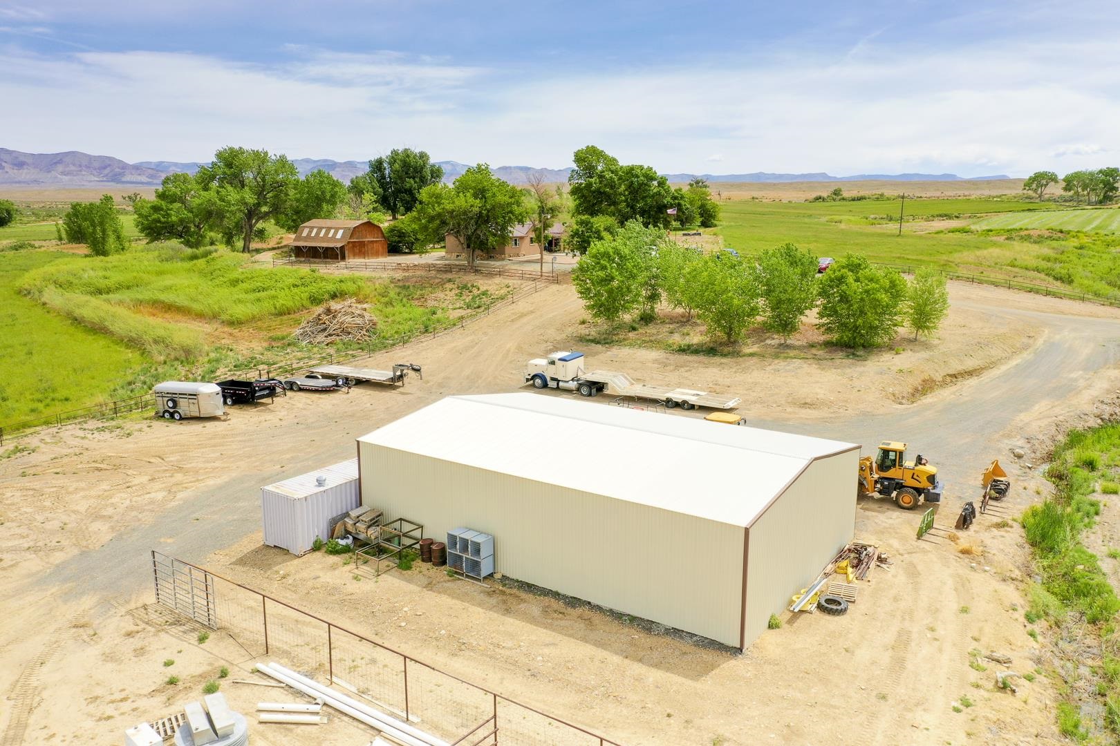 990 T Road Mack, CO 81525 - Photo 32 of 42 a view of a swimming pool and a yard
