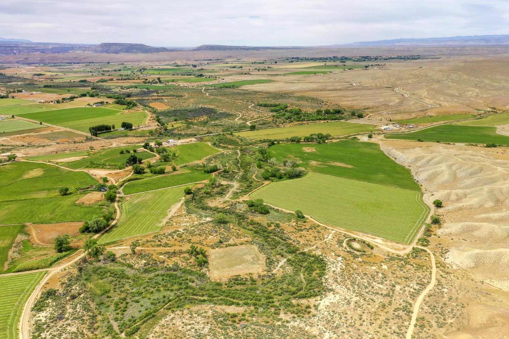 990 T Road Mack, CO 81525 - Photo 36 of 42 a view of an ocean and a mountain
