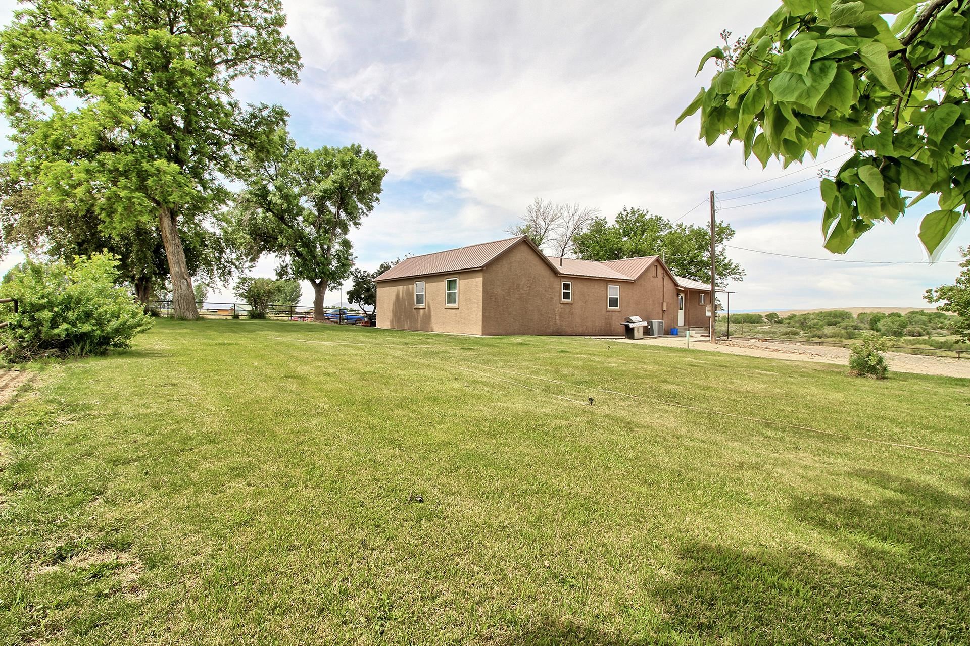 990 T Road Mack, CO 81525 - Photo 38 of 42 a view of a house with a big yard