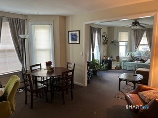 202 Berlin Avenue Southington, CT 06489 - Photo 15 of 26 a view of a livingroom with furniture and a table