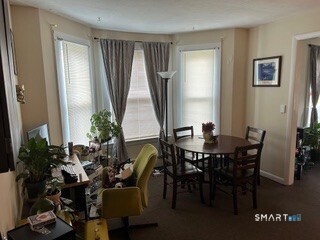 202 Berlin Avenue Southington, CT 06489 - Photo 17 of 26 a view of a dining room with furniture and window