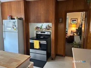 a view of kitchen and living room