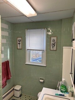 202 Berlin Avenue Southington, CT 06489 - Photo 9 of 26 a bathroom with a toilet a sink and mirror