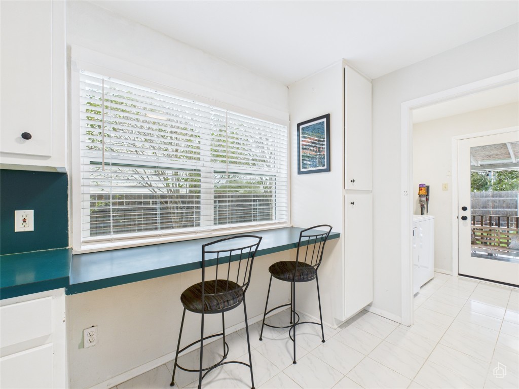 1404 Lance Way Austin, TX 78758 - Photo 16 of 29 a view of a room with furniture and windows