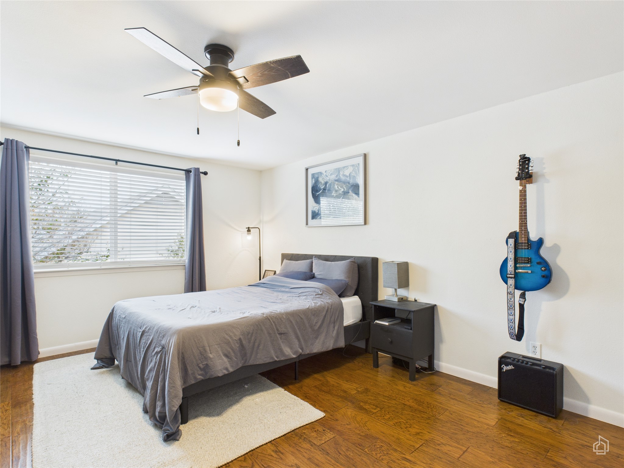 1404 Lance Way Austin, TX 78758 - Photo 21 of 29 a bedroom with bed and window