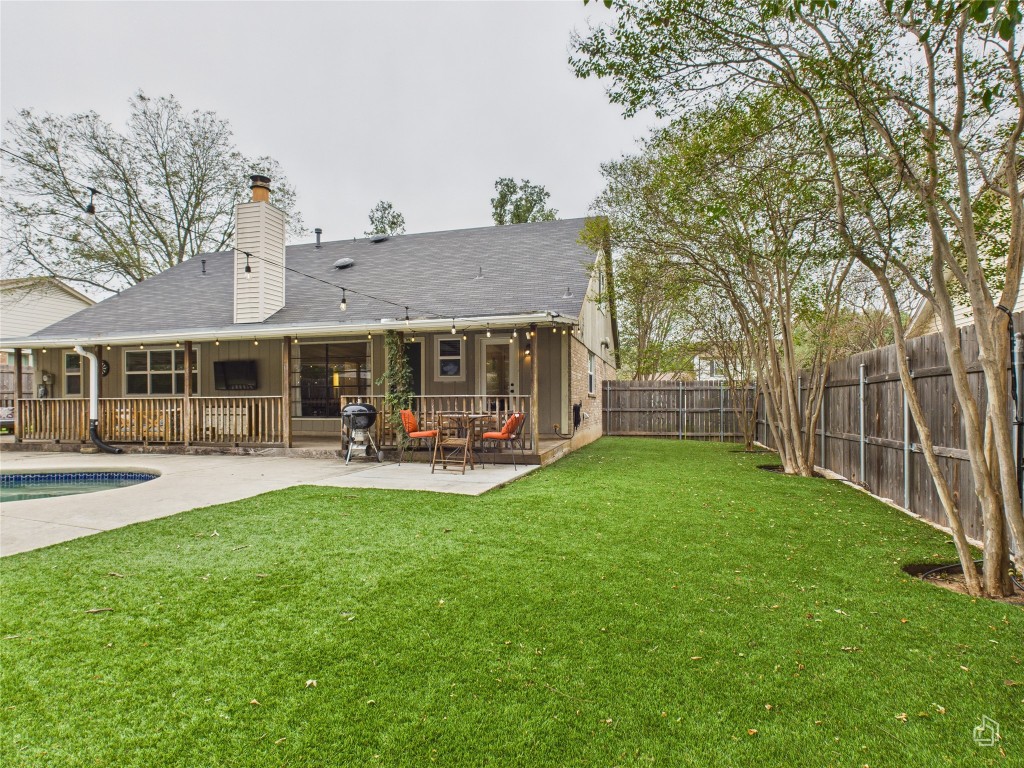1404 Lance Way Austin, TX 78758 - Photo 25 of 29 a view of a house with a yard porch and sitting area