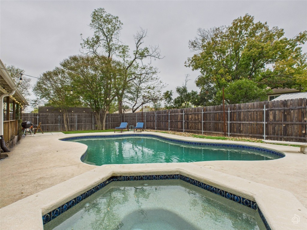 1404 Lance Way Austin, TX 78758 - Photo 29 of 29 a view of a backyard with swimming pool