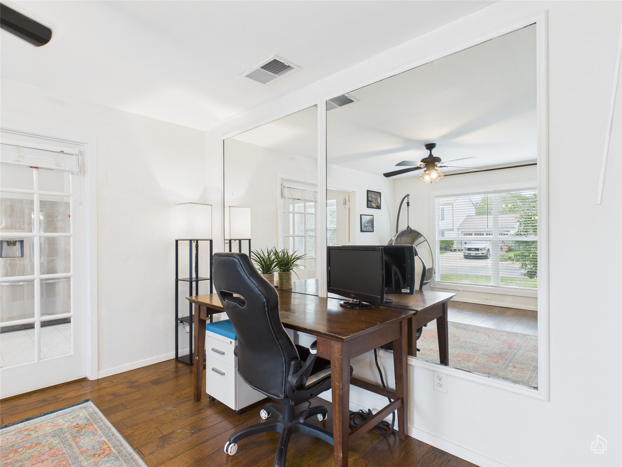 1404 Lance Way Austin, TX 78758 - Photo 7 of 29 a view of a workspace with furniture and a window