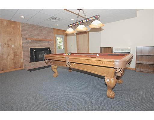 264 Roupe Road Eighty Four, PA 15330 - Photo 13 of 18 Den/Family/Great Room. A super sized game room with wood burning fireplace is the perfect place for large gatherings.