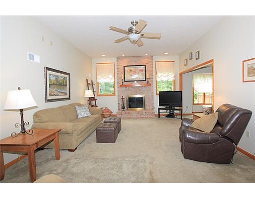 264 Roupe Road Eighty Four, PA 15330 - Photo 3 of 18 Living Room. The beautiful brick, wood burning fireplace, is the focal point of the livingroom.