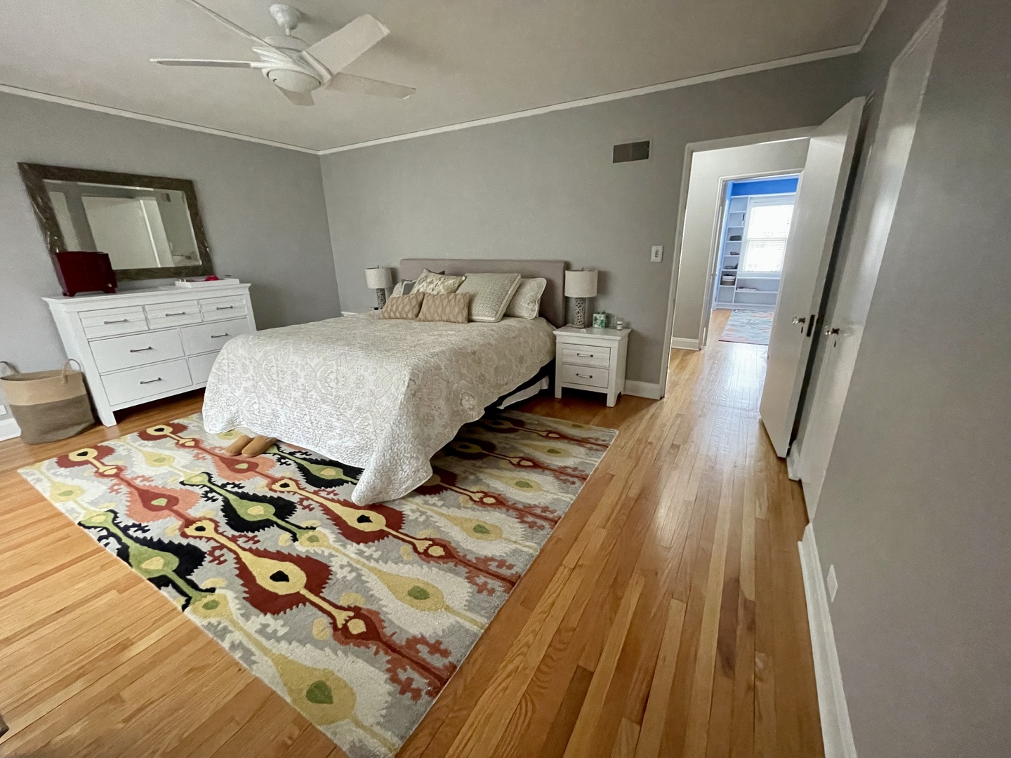 1035 Bonnie Brae River Forest, IL 60305 - Photo 14 of 21 a bedroom with a bed and a mirror on the dresser