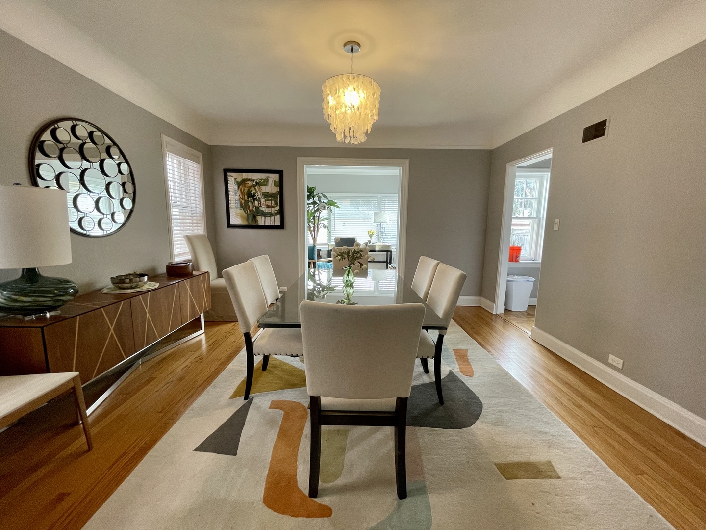 1035 Bonnie Brae River Forest, IL 60305 - Photo 7 of 21 a view of a dining room with furniture and chandelier
