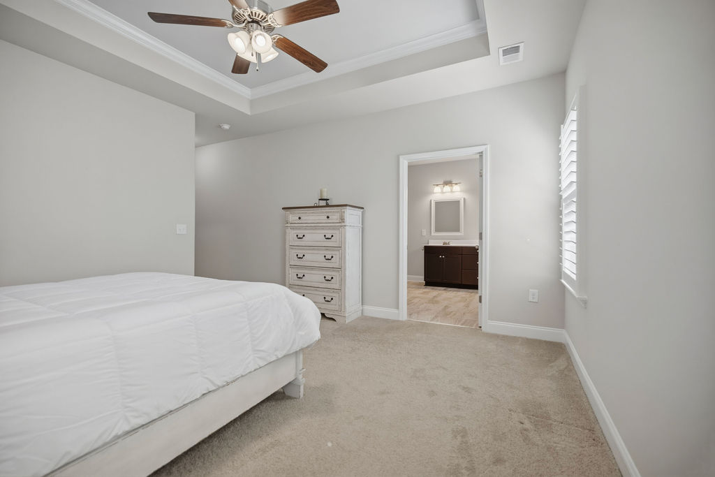 139 Olde Towne Drive Anderson, SC 29621 - Photo 15 of 26 This serene bedroom offers a tranquil retreat with a spacious layout and easy access to an adjoining bathroom.
