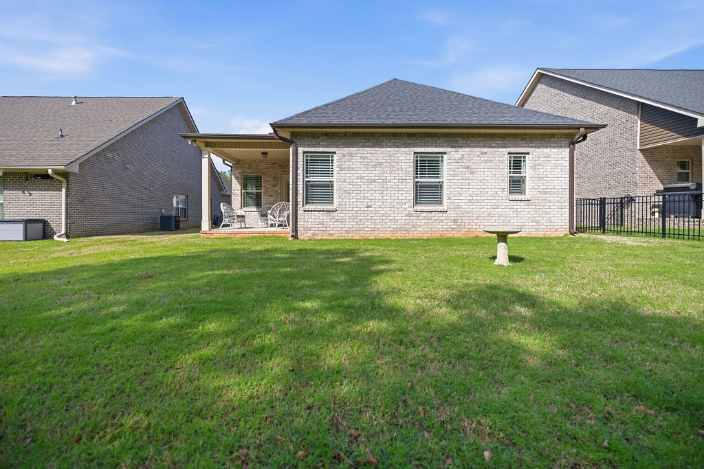 139 Olde Towne Drive Anderson, SC 29621 - Photo 22 of 26 This residence features a meticulously maintained yard and a charming covered patio for outdoor enjoyment.