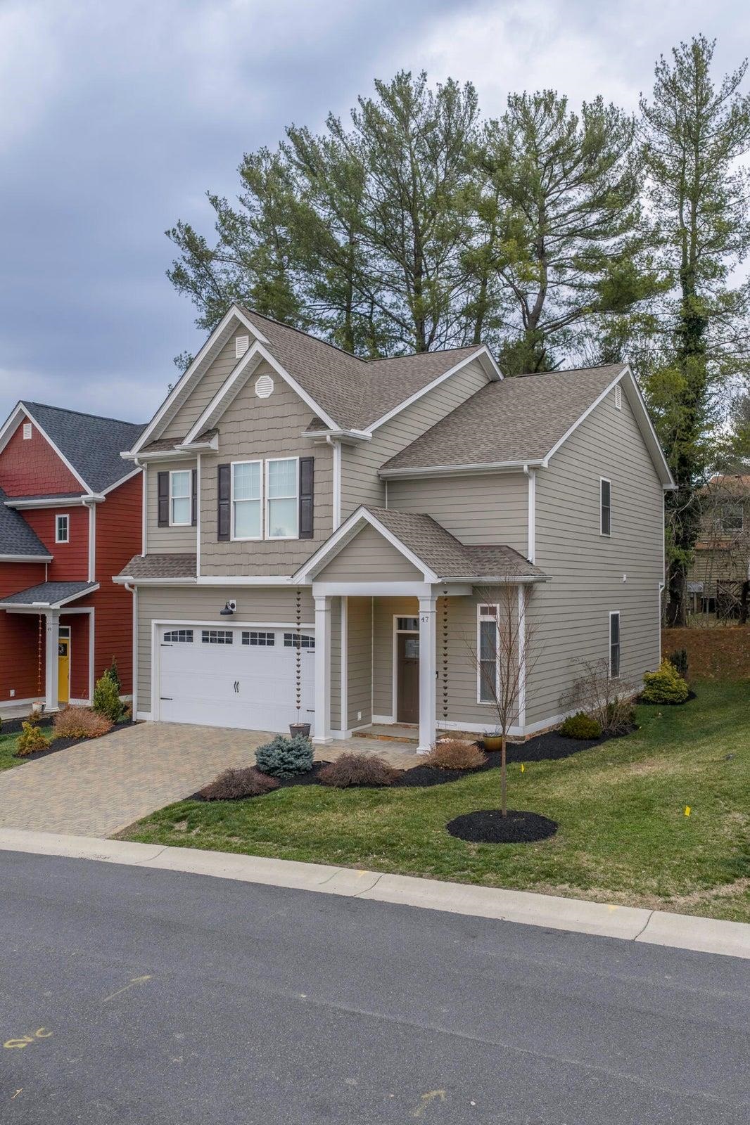 Charming newly built Craftsman-style home is ideally situated just 3 minutes from historic downtown Lexington.