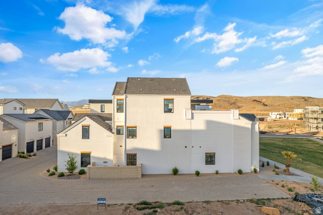 5367 Cyan Lane St. George, UT 84790 - Photo 17 of 49 Modern multi-story property featuring white siding and a dark shingled roof