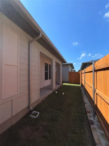 a view of kitchen and kitchen with furniture wooden floor and window