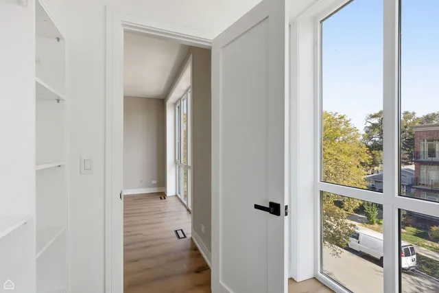 a view of a bathroom from the hallway