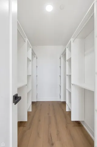 a view of an empty walk in closet