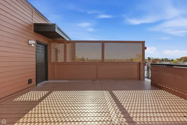 a outdoor living space with furniture and city view