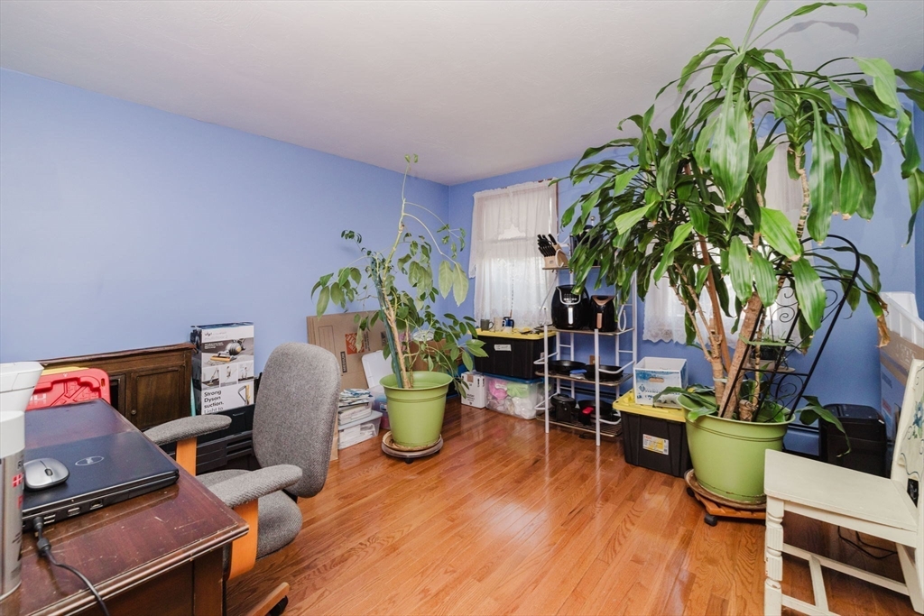 36 Indian Run Road Bellingham, MA 02019 - Photo 16 of 33 a living room with furniture and a potted plant
