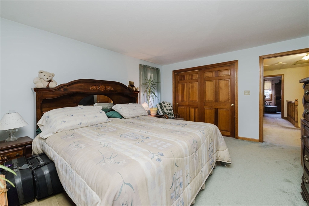36 Indian Run Road Bellingham, MA 02019 - Photo 24 of 33 a bedroom with a bed and a closet