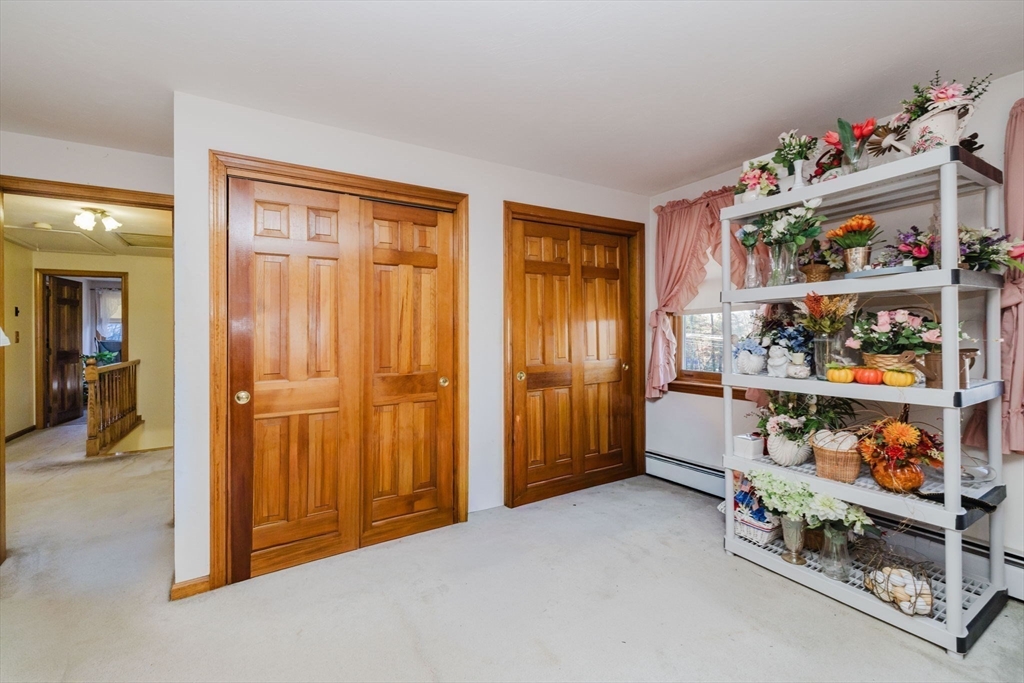 36 Indian Run Road Bellingham, MA 02019 - Photo 26 of 33 an empty room with shelves
