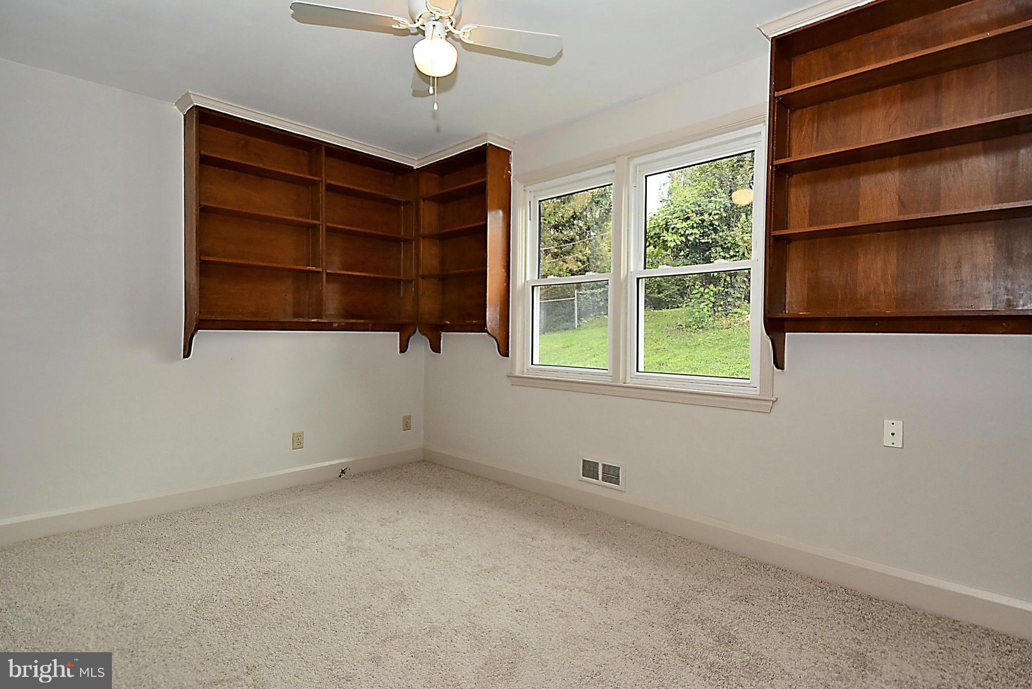 1311 Glendale Road Baltimore, MD 21239 - Photo 20 of 30 Third Bedroom (or den!) with Built-In Bookcases