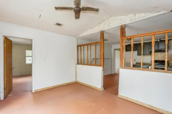 an empty room with windows