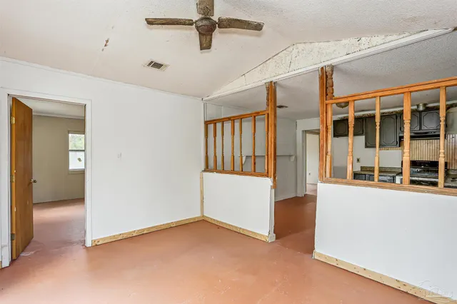 an empty room with windows