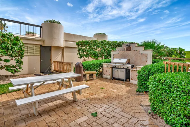 a view of a lake with houses in the back