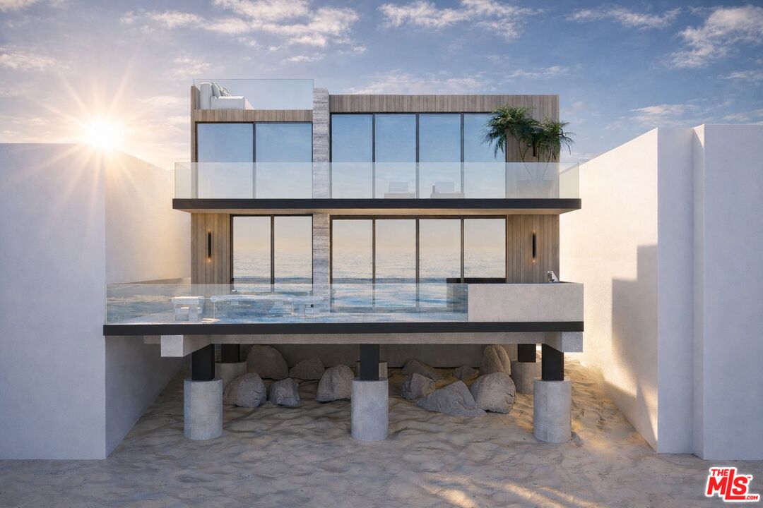 25360 Malibu Road Malibu, CA 90265 - Photo 2 of 2 a dining table & chairs in a room