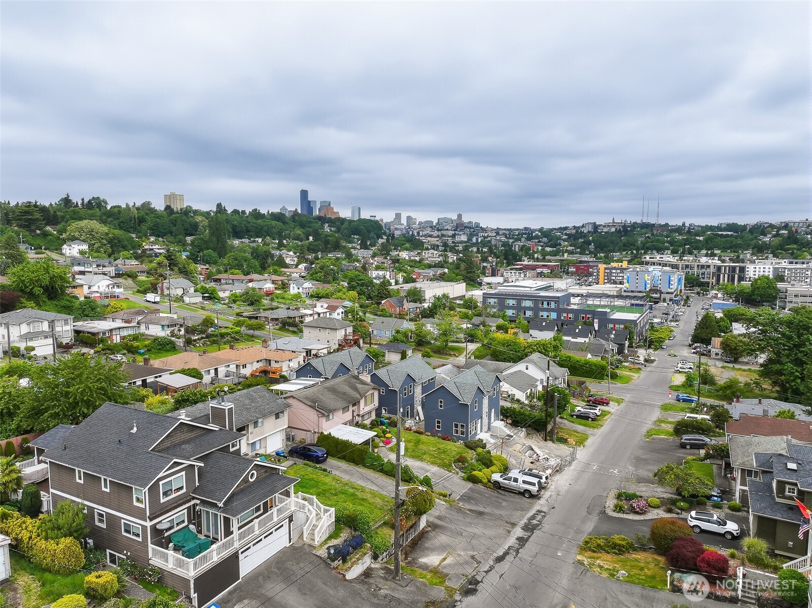2317 22nd Avenue South Seattle, WA 98144 - Photo 6 of 29 an aerial view of a residential houses with city view