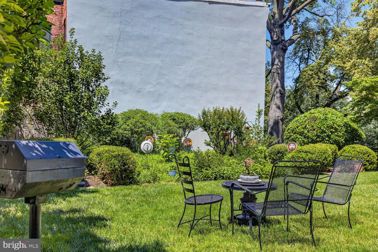 410 5th Street Northeast, Unit 1 Washington, DC 20002 - Photo 34 of 37 Charming garden retreat with seating.