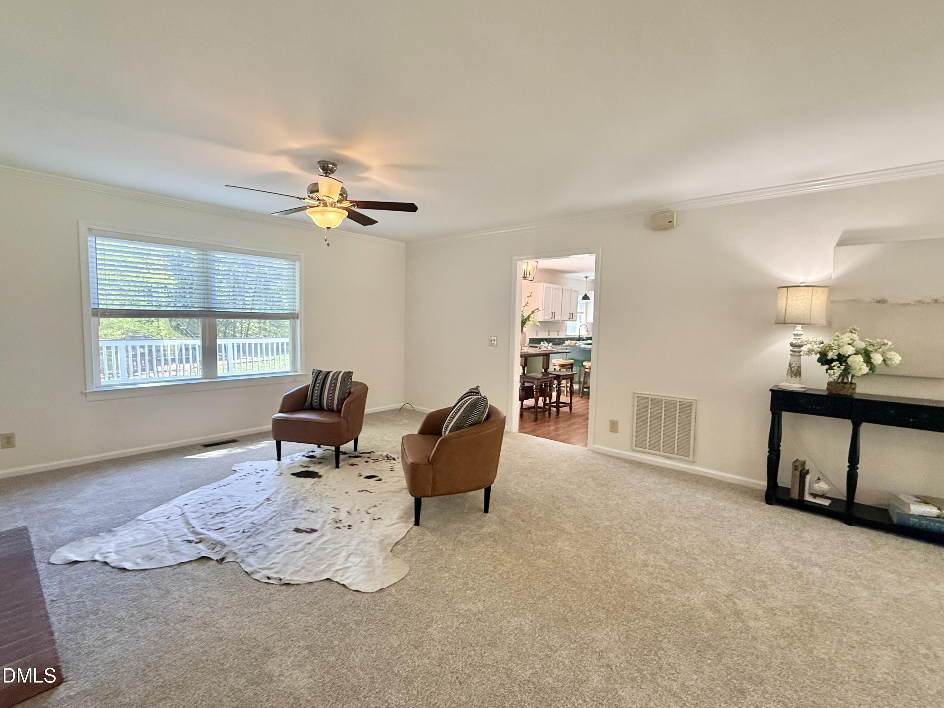 2429 Halifax Road Roxboro, NC 27573 - Photo 12 of 54 a living room with furniture and a window