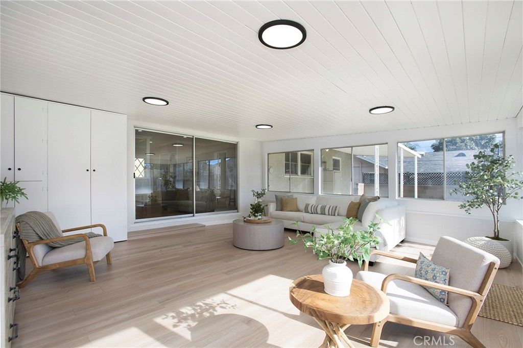 708 East Alder Street Brea, CA 92821 - Photo 12 of 34 a view of a livingroom with furniture and a potted plant