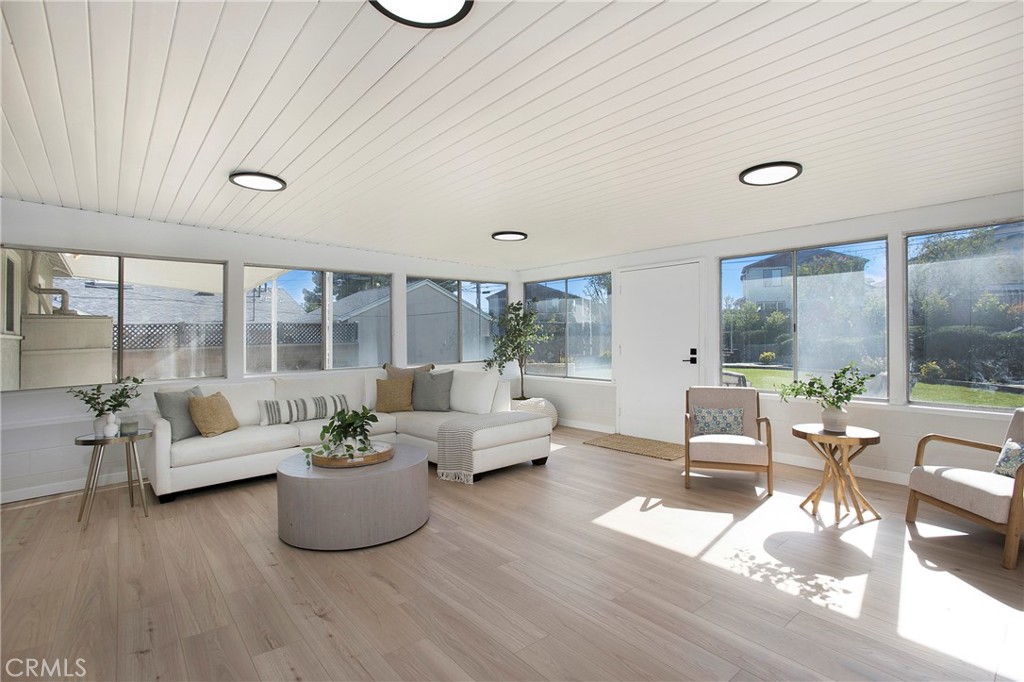 708 East Alder Street Brea, CA 92821 - Photo 13 of 34 a living room with furniture and a large window